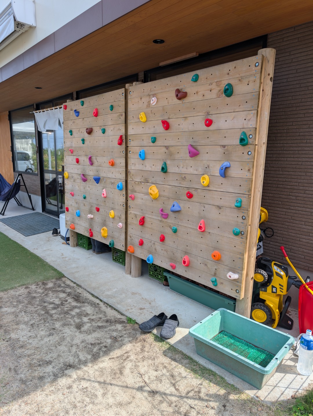 A small rock climbing wall.